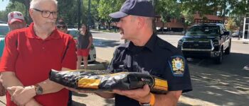 Peace Officer Distributing Food